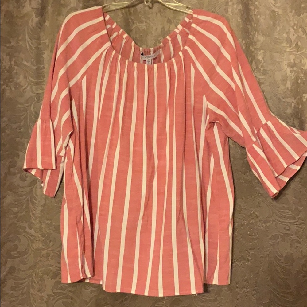 Pink and white striped blouse.